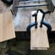 A couple of oak floorboards marked and ready to cut to length for base and back of the remodelled magazine rack