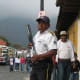 Private security guard with shotgun, guarding a bank in Antigua Guatemala.