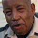 A security guard at a parking lot next to the West Village Apartments in Durham, North Carolina.