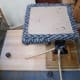 Old cat scratching post utilised as activity centre in new cubbyhole, turned upside down to screw to top of cubbyhole