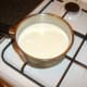 Heating blitzed vegetable, cream and stock
