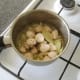 Chicken, mushrooms and herbs are added to softened garlic and onion