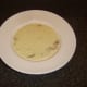 Cream of chicken, asparagus and mushroom soup is ladled in to serving plate