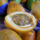 The juicy interior with the seeds is eaten