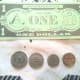 The "play" money looks almost like real US coins and dollars.