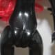 Random scratches and chips on doll's lower back