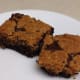 Refrigerated chocolate chip cookie dough spread over boxed brownie batter, and baked
