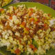 Snack--popcorn with candy corns and leftover caramel poured on top.