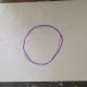 1. On wax paper, trace an outline of the Saturn yarn ball's middle section.