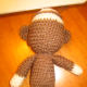 Sew head on body.