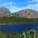 View across Nantesdam towards Paarl Rock. Gordon’s Rock is on the left and Bretagne Rock to the right.