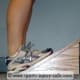 Gastroc stretch on wooden angled board