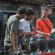 Tourists in Kathmandu making a bargain.