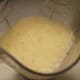 Add enough ice to fill the blender container about halfway and blend for about 30 seconds.