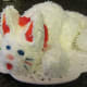 Use a small piece of the fruit roll up for the tongue and Place colored toothpicks for whiskers.