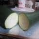 Cut zucchini in half. Then cut those halves horizontally in half.
