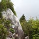 Take the unmarked side trail up and climb the rock. Be careful - it's steep and you'll need to watch your footing.