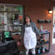 Mad science costume with a lab apron, goggles, and other details