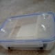 Suction cups added to the face plate lid of scrubber