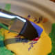 Finally, dip the magenta-side of the brush into the yellow. You're ready to go.