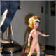 Once Tammy made it through the salon, her head was carefully repositioned back into place. Tammy was then posed standing under the lamp for the next three days.