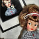 Tammy's hair was restyled again as shown above for her auction photo session. The coordinated rubber headband and ribbon secures her hair style as she travels to her new home.
This doll's makeup is all original. There was no need for touch-ups.