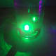 A waterproof LED in a vase with water.