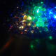 Submersible LED lights in a vase of water beads.