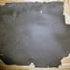 Original backing paper, crumbly and flaky