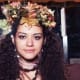 Cover an entire flat headband with flowers for a pretty headdress.