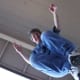 To get this shot, I put my Canon EOS Rebel T1i on the ground pointing up and set it to timer burst mode. Then I stood on a chair and leaned over the camera and used a pole to press the shutter halfway down to focus. When the timer ran out, I jumped o