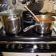 While the potatoes are boiling start preparing the meat-free mince on the stove