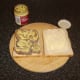 Dijon mustard is spread on the beef tongue