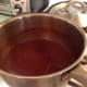 After about five hours, your juice will be reduced enough that it will start to turn into syrup. When it clings thickly to a spoon, you are done.