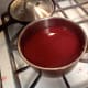 Put the twice-strained juice back on the stove and simmer for 4-6 hours. Stir constantly and make sure it doesn't burn on the bottom.