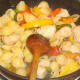 Conchiglie pasta is stirred through spicy chicken and peppers