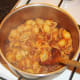 Conchiglie pasta is stirred through beef and tomato sauce