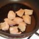 Frying chicken breast in olive oil
