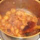 Conchiglie pasta is stirred through spicy beef and tomato sauce