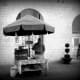 A sweet chestnut vendor who set up his stand with charcoal brazier in the same place on the Piazza di Commune (town square) every day.