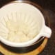 Cauliflower is carefully drained to serve