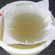 Straining duck stock
