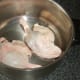 Duck legs in poaching pot