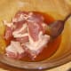 Diced duck meat is added to biryani spices