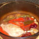 Duck leg casserole removed from the oven