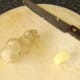 Peeling fresh ginger root
