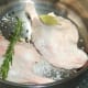 Seasonings are added to duck legs