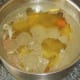Duck stock combination is left to cool slightly