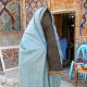 Woman in Uzbekistan wearing a paranja