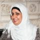 Saudi politican Norah Al Faiz in her pashmina scarf paired with an undercap and robe
